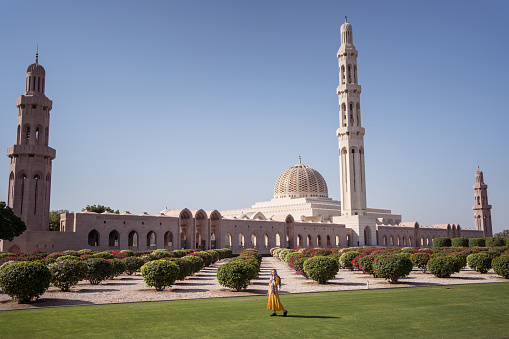 Muscat / Oman - February 10, 2020: Tourist inside Sultan Qaboos Grand Mosque