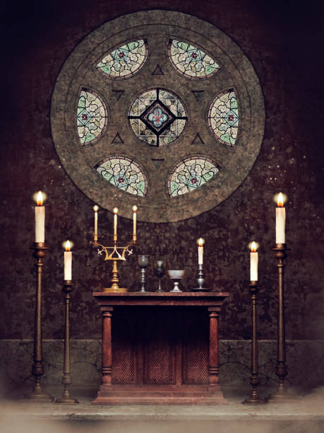 istock Old church window with candles 1271289744