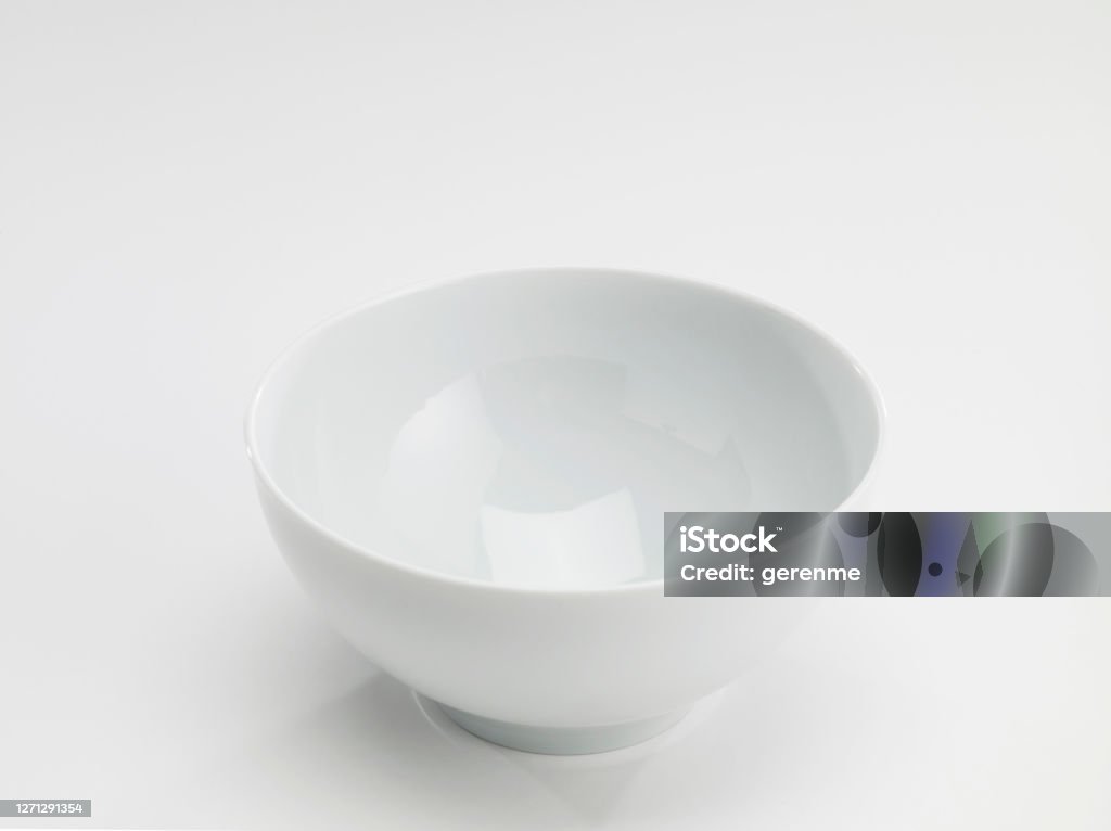 Empty bowl Looking down empty pie bowl on white background Bowl Stock Photo