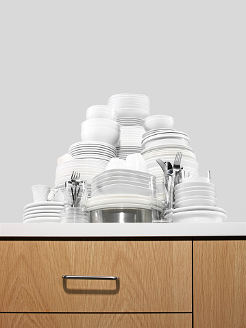 Looking up to a pile of clean dishes
