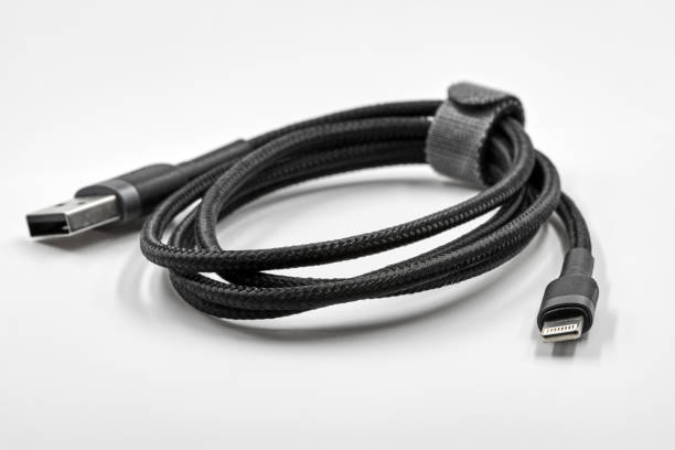 istock Black adapter USB to micro USB type c data and power cable on white background. Closeup 1271293138