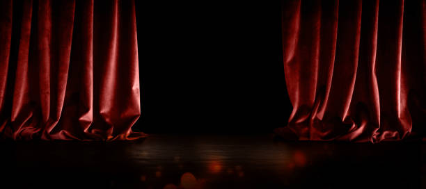 istock Dark stage scene with red curtain 1271295079