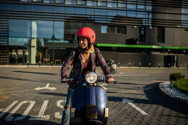 istock Young businesswoman on motorcycle 1271295535