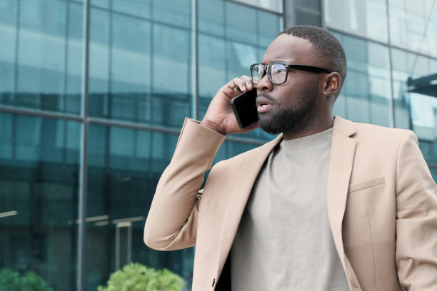 istock African man talking on the phone 1271296827