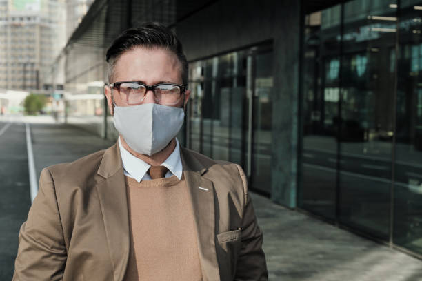 istock Man in mask outdoors 1271296975