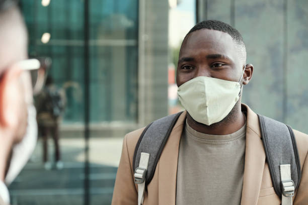 istock African man in mask outdoors 1271297092