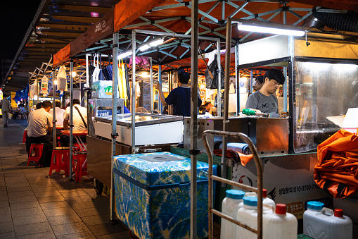 Seoul, South Korea - August 22, 2019: Market food stall in Seoul city center at night