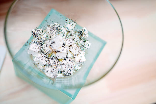 Feta cheese in a transparent bowl