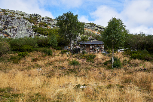 A beautiful landscape of a mountain refuge in the mountains of Asturias in Spain