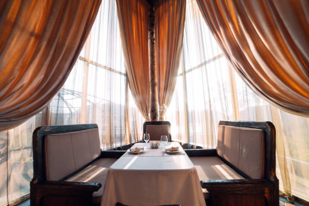 istock Served table for two persons in a trendy restaurant. 1271300744