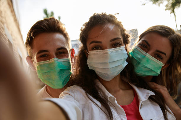 istock Three happy friends taking a selfie 1271302328