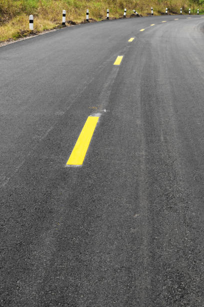 istock Yellow new road curves. 1271305613