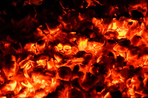 istock Hot and burning coals in a brazier at night. 1271308812