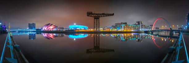 Clydeside at Night. Panorama of Glasgow facing north over the River Clyde. glasgow scotland stock pictures, royalty-free photos & images