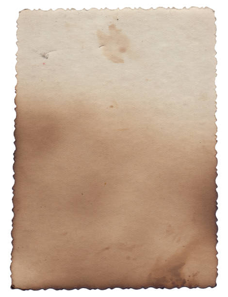 istock Old vintage texture retro paper with burned edges, stains and scratches background 1271312864