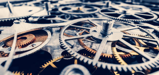 istock Gears and cogs mechanism. Industrial machinery 1271314084