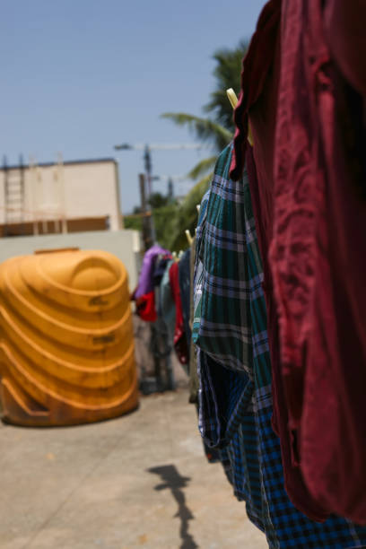 istock Rope with clean clothes outdoors on laundry day 1271314641