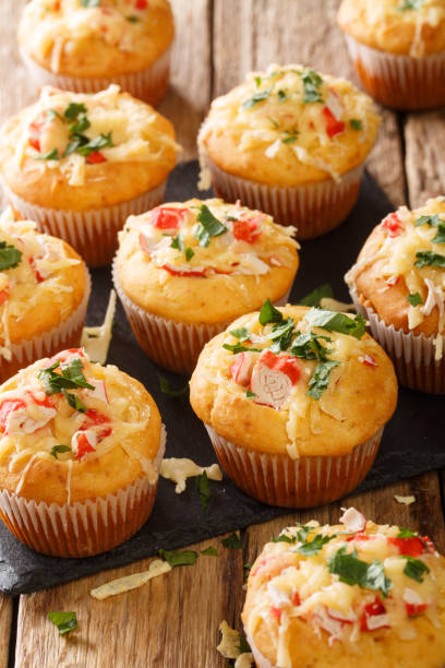 istock Corn muffins with crab meat and cheese close-up on a slate board. vertical 1271319581