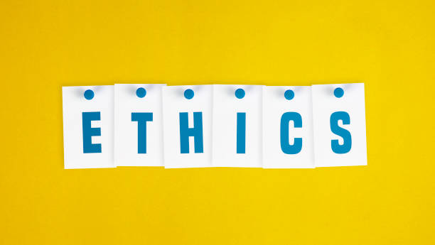 istock Ethics Writes on White Pinned Post it over Yellow Paper. 1271321687