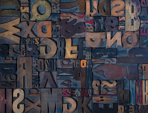 A montage of wooden letterpress blocks for use as a background