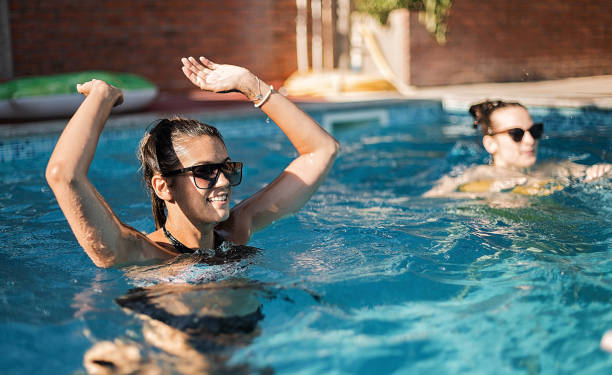 istock Friends playing volleyball 1271324706