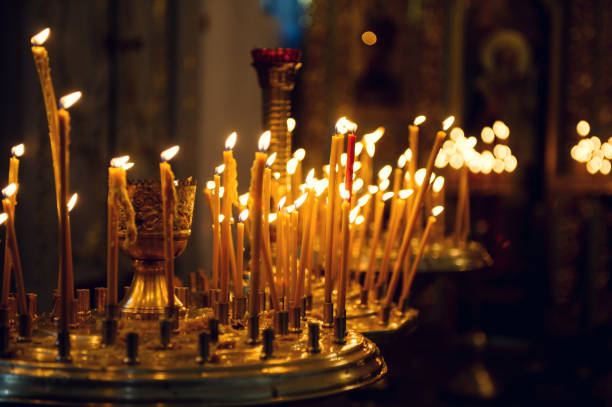 istock Candles in church 1271325179