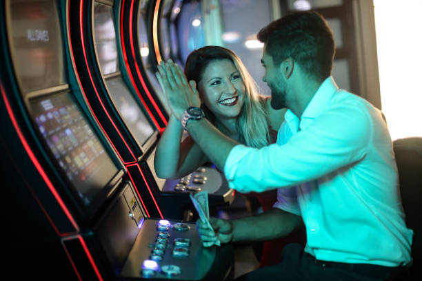 istock Young couple playing slots 1271326755