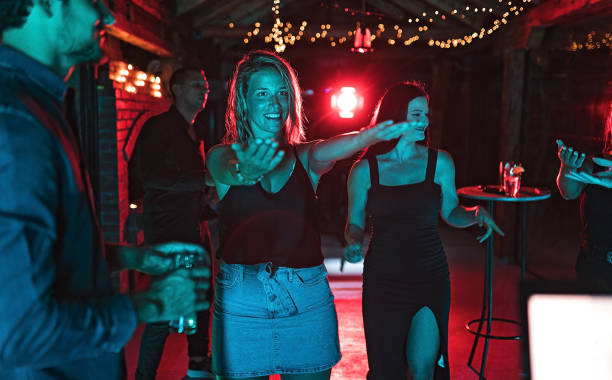 istock Young happy people at party 1271328214