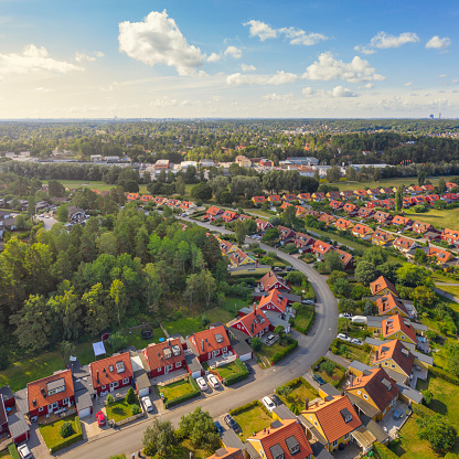 Panoramic aerial view of a beautiful subdivision in an upscale neighborhood in Georgia, USA shot during golden hour