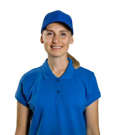 attractive smiling woman in blank blue polo shirt and hat isolated on white background