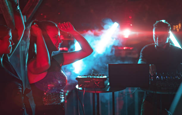 istock People enjoying at night club 1271329678