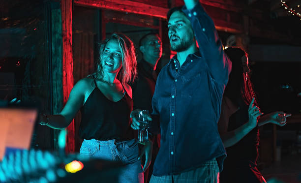 istock Couple dancing in the club 1271331133