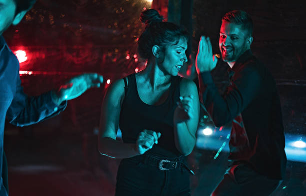 istock Couple dancing in night club 1271331162