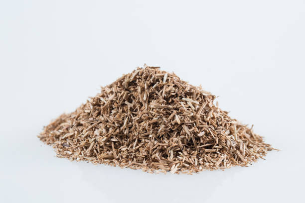 istock Pile of wood smoking chips isolated on white. 1271332709