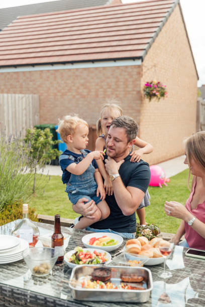 istock Family Eating Outdoors 1271333536