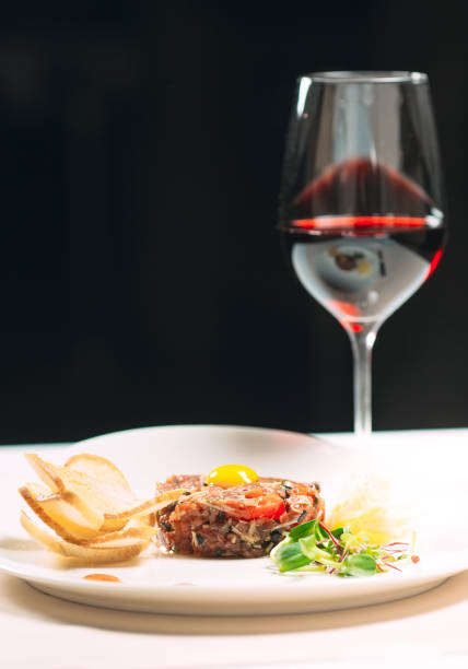 istock Tartar dish in the restaurant on a white plate 1271335023