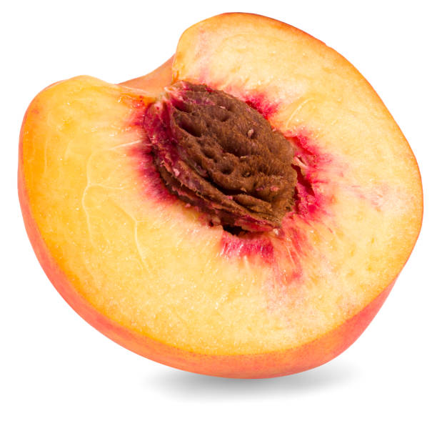 istock half of peach fruit isolated on white background. full depth of field 1271335122