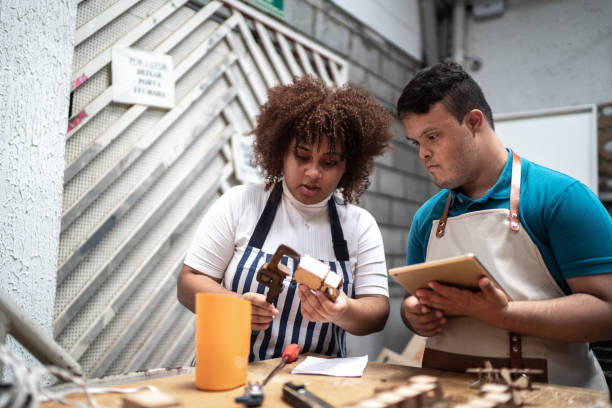 istock Coworkers working at craft warehouse checking toys 1271335467