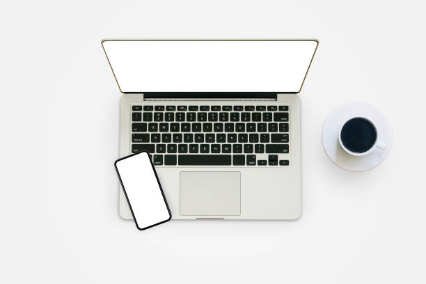istock Laptop and smartphone with white blank screen on gray background. 1271336683