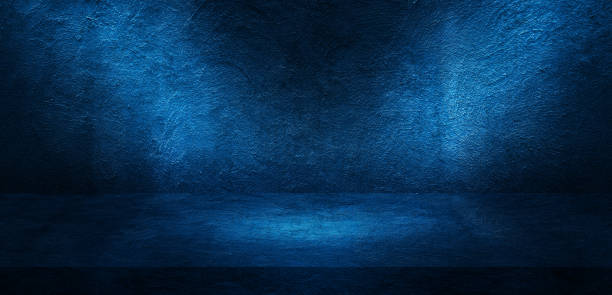 istock Plaster concrete wall grunge texture background with blue lighting effect for product showing. 1271336979