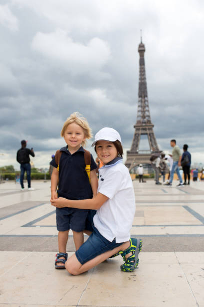 istock Happy siblings, boys, visiting Paris during the summer 1271338074