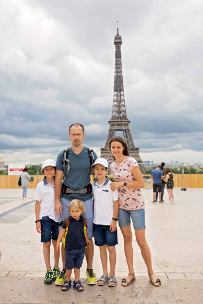 istock Happy family with children, visiting Paris 1271338124