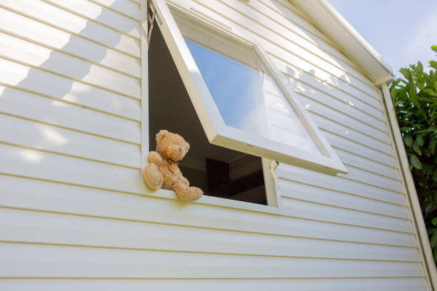 istock Teddy bear, sitting on the window of mobile home 1271340791