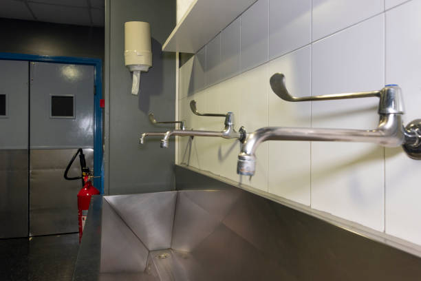 istock surgical hand washing pile in operating room corridor. 1271342426