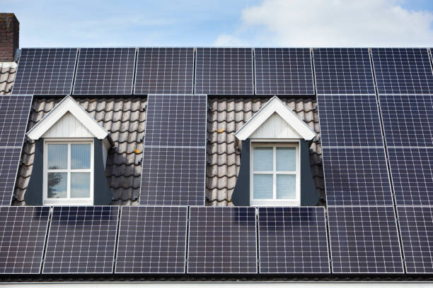 istock solar panels on a roof with two dormers 1271345834