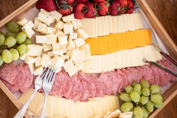 tavola salumi - cheese tray cube swiss cheese foto e immagini stock