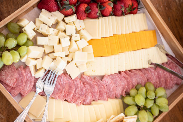 charcuterie борту - cheese tray cube swiss cheese стоковые фото и изображения