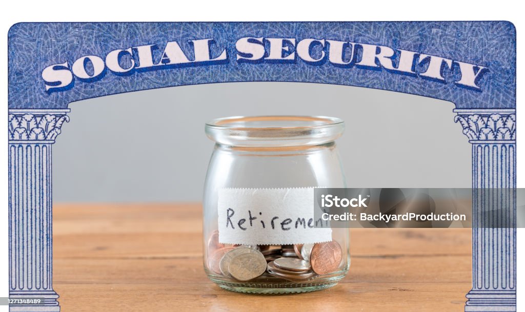 Loose change inside glass jar to represent retirement savings for Social Security Loose change and coins inside a glass jar to represent lack of retirement savings in Social Security Trust fund Social Security Stock Photo