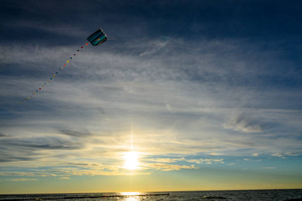 Hang gliding by the sea