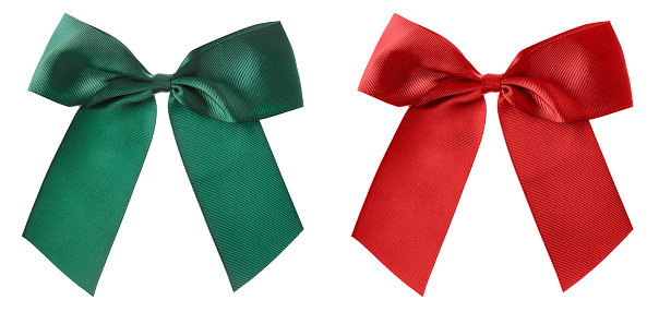 Big green and red bows for gift wrapping isolated on white background.